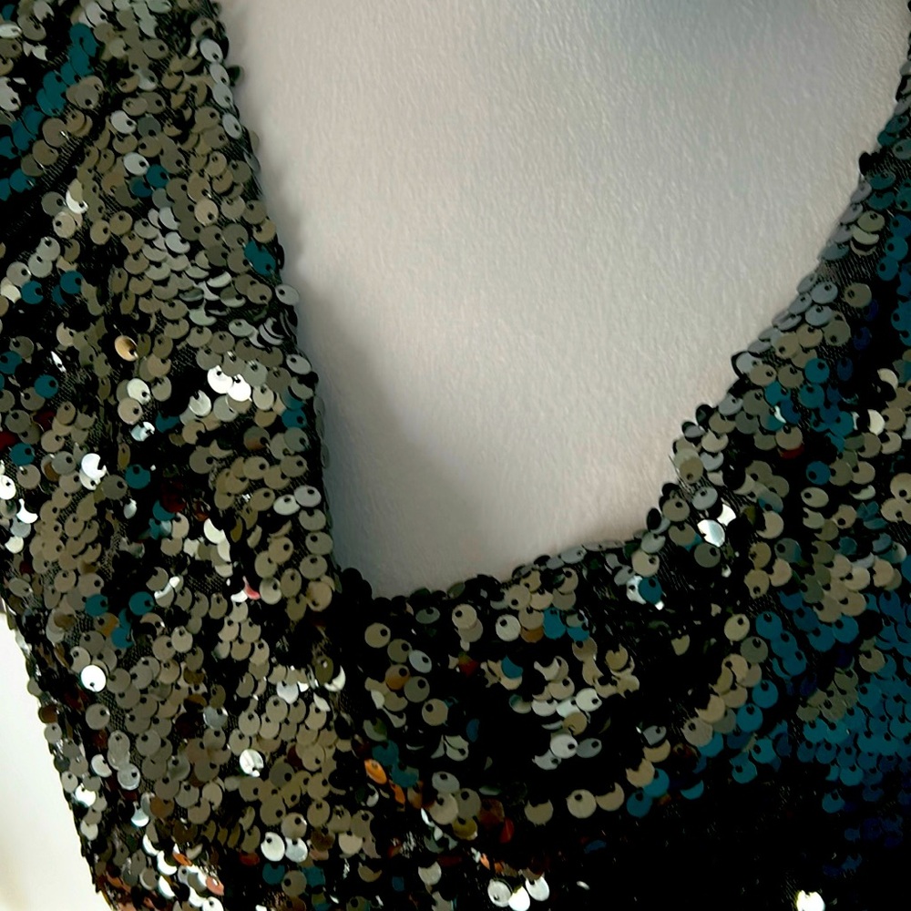 beautiful sequined top 
greenish color is so elegant